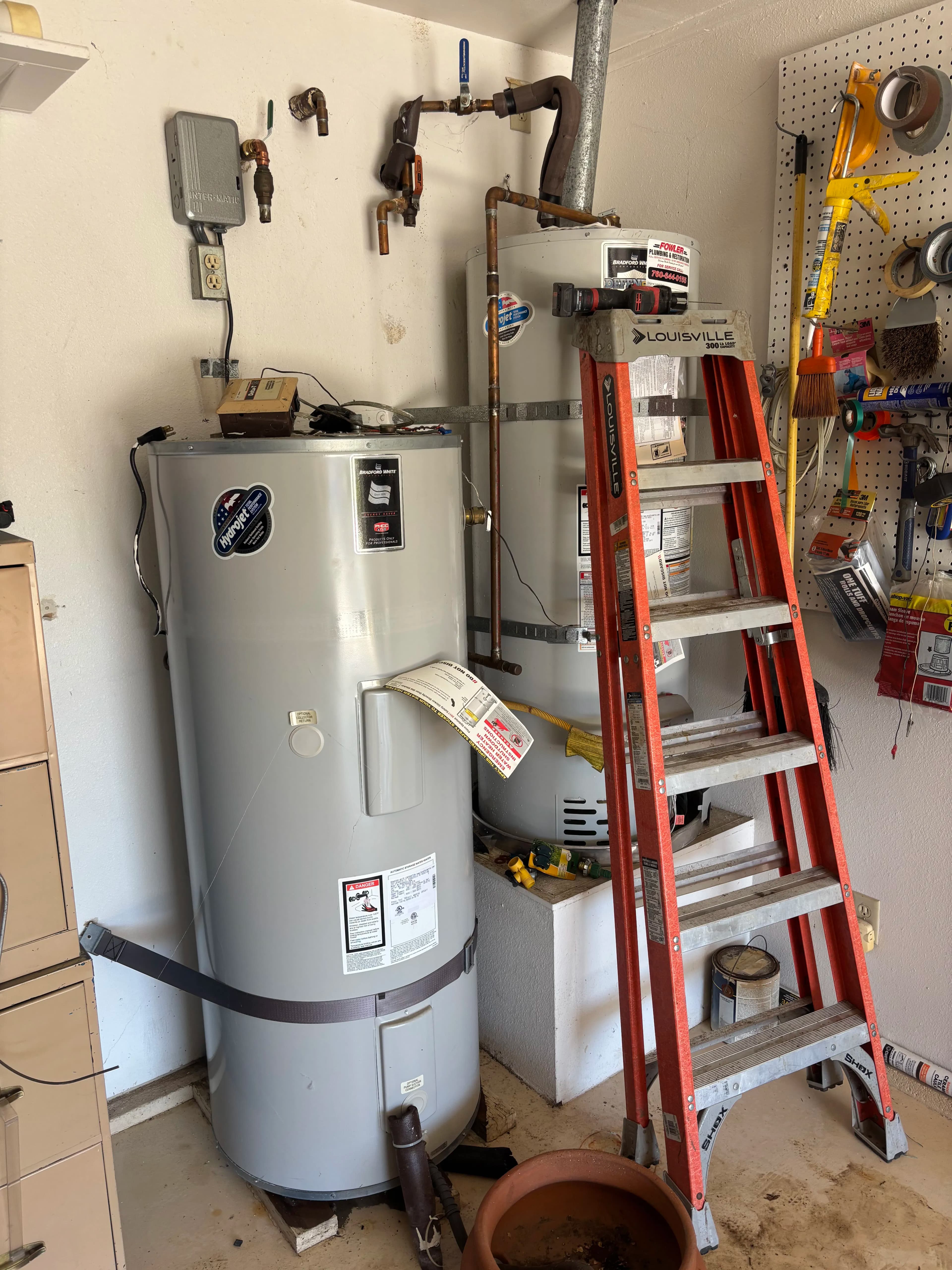Project Removing an Outdated Solar Water Heater Setup From a Garage image